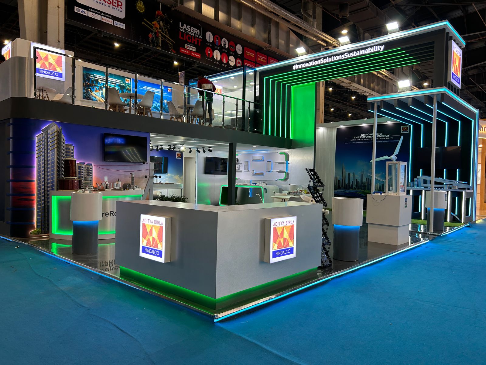 Modern exhibition booth design in India showcasing products and branding